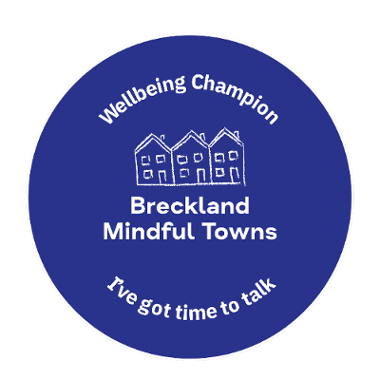 Blue background with white text that says Breckland Mindful Towns, wellbeing champion, I've got time to talk. Illustration in hand-drawn style of the outline of three terraced houses as the logo in white